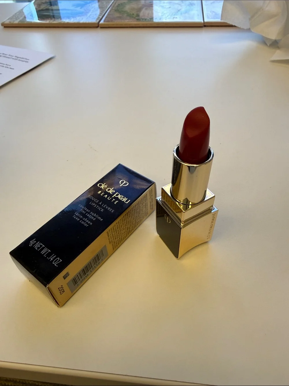cle de peau beauty red Satin Lipstick in 103 Legend of Rouge